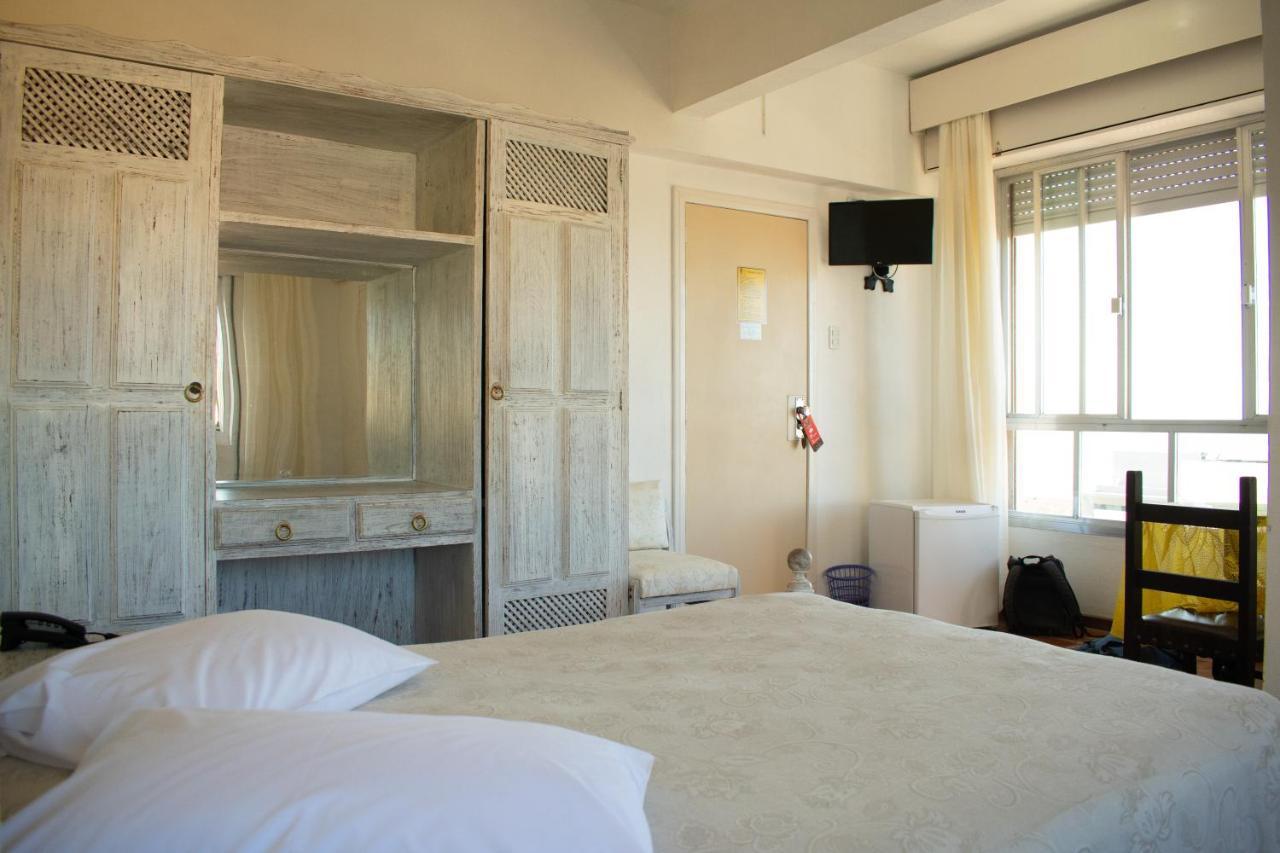 Farol Hotel Torres Esterno foto