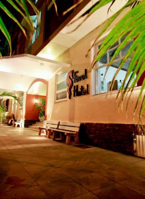 Farol Hotel Torres Esterno foto