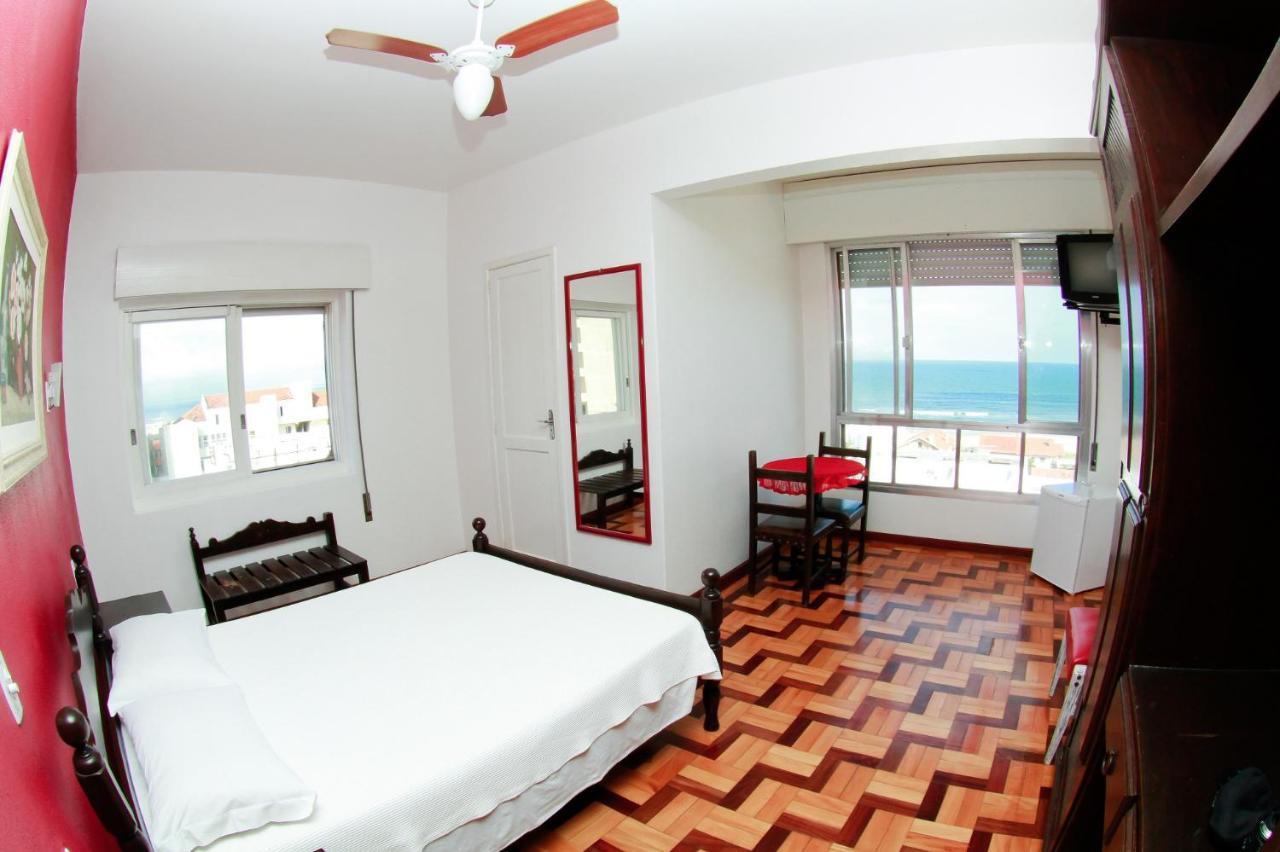 Farol Hotel Torres Esterno foto